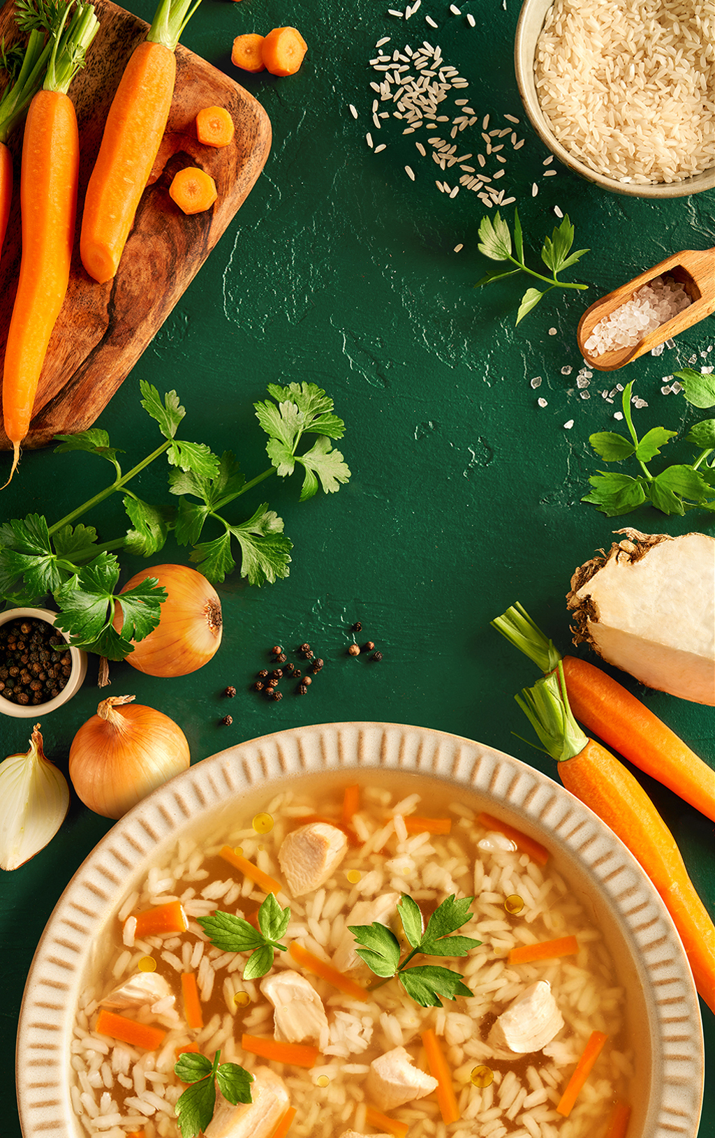 Chicken broth soup with green background and vegetables for packshot