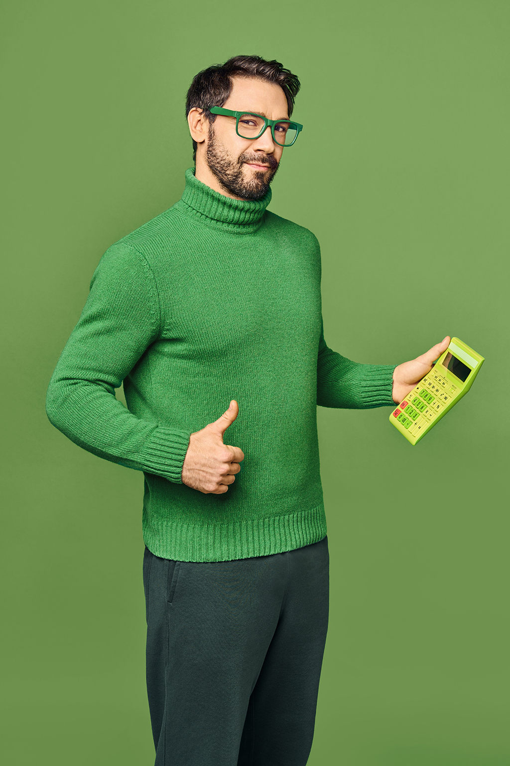 man in green with calculating mashine