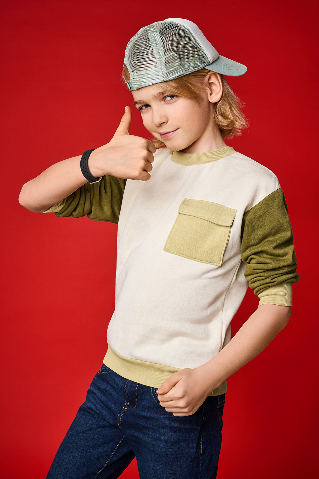 happy boy on red background